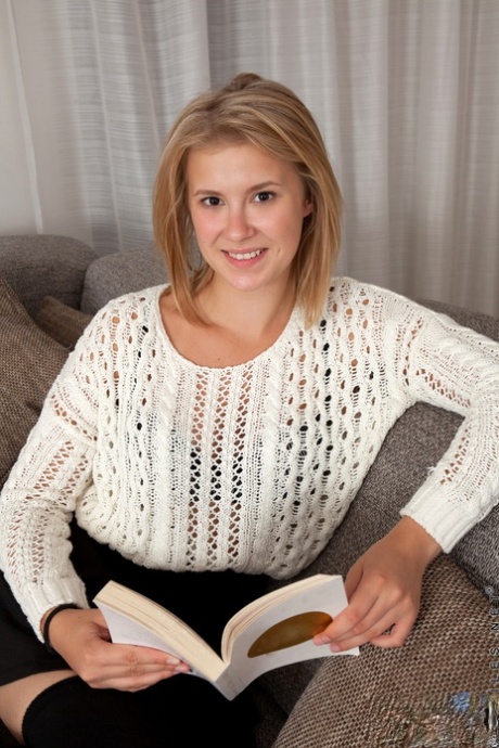 Young blonde girl Elza A makes her nude modeling debut in over the knee socks