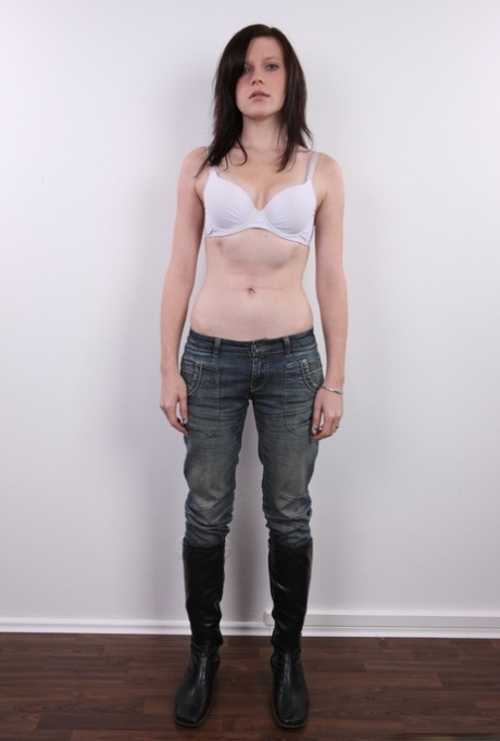 Amateur girl Jana removes her underwear to finish getting completely naked