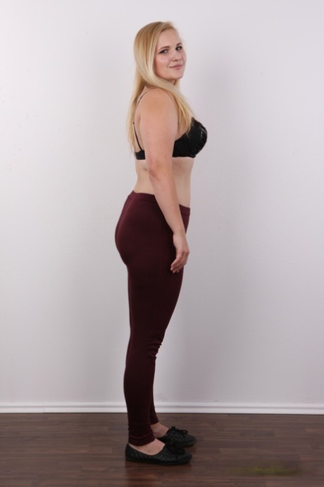 Chubby blonde teen Jana shows her pierced cunt during her nude debut