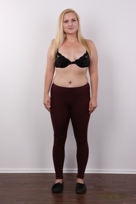 Chubby blonde teen Jana shows her pierced cunt during her nude debut