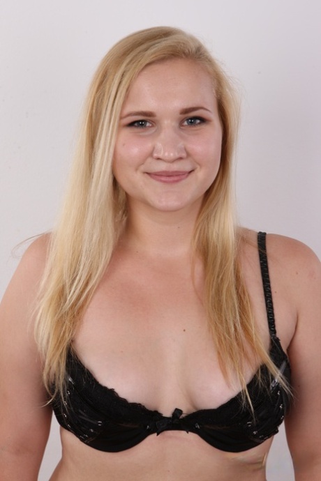 Chubby blonde teen Jana shows her pierced cunt during her nude debut