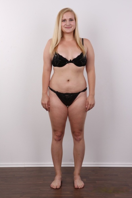 Chubby blonde teen Jana shows her pierced cunt during her nude debut