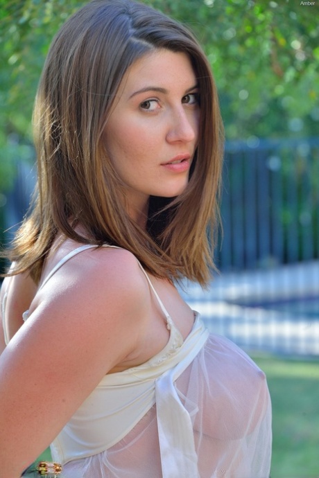 Solo girl in sheer dress flashes on walkway and gets freaky with a cucumber