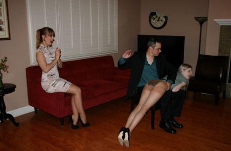 Leggy blonde Violet October has her bare ass spanked by Nikki Rouge's husband