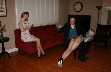 Leggy blonde Violet October has her bare ass spanked by Nikki Rouge's husband