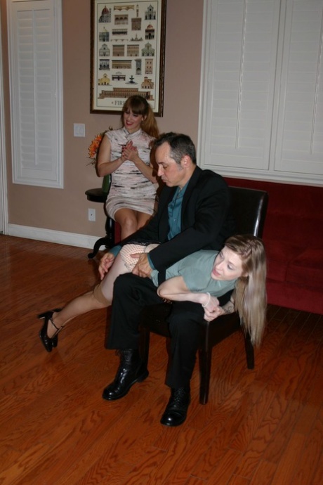 Leggy blonde Violet October has her bare ass spanked by Nikki Rouge's husband