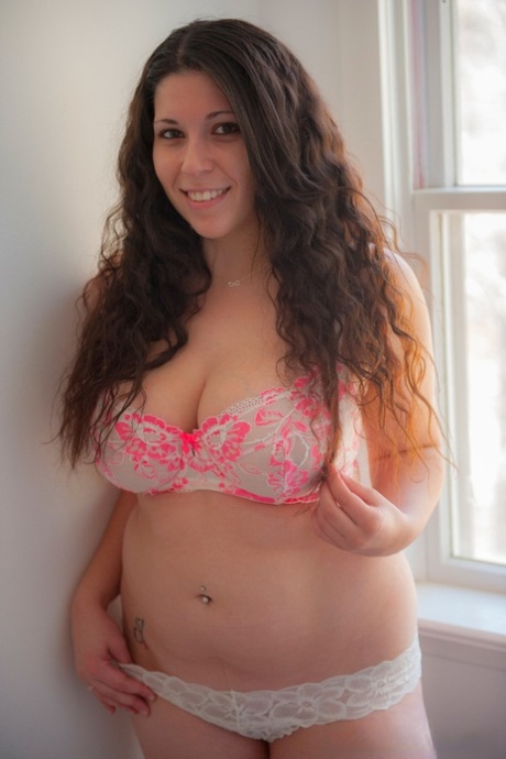 Sexy BBW undresses to model her sweet big saggy boobs and hot large ass