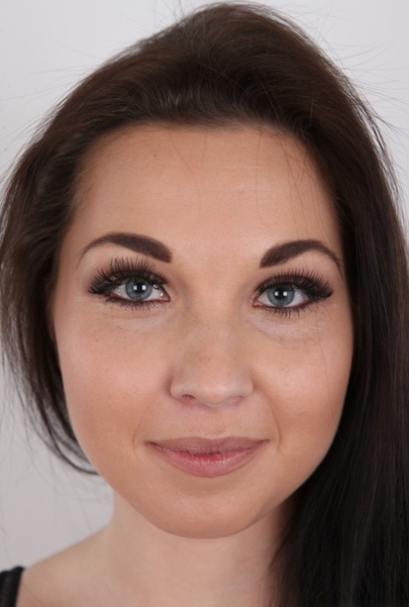 Pretty face Nikola photographed in stages of undress for porn directory