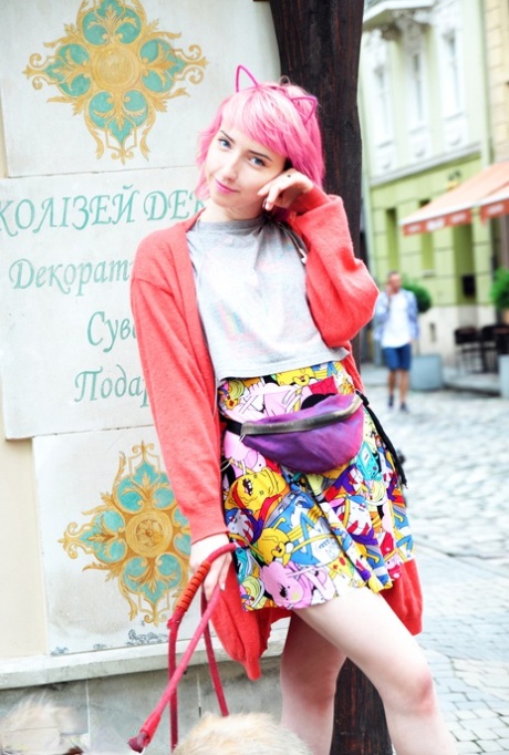 Teen solo girl with pink hair display her bald twat in yellow OTK socks