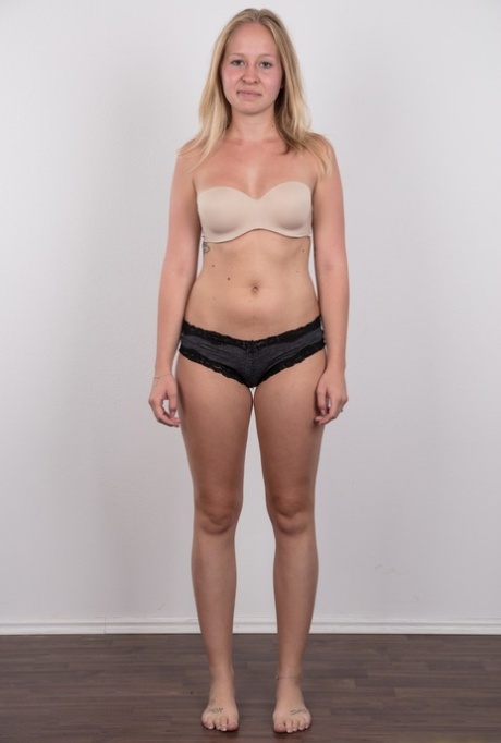 Blonde amateur Veronika exposes her tan lined tits in black underwear