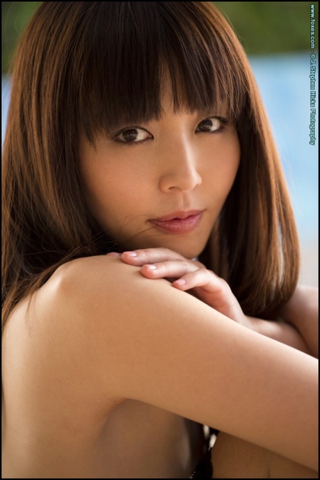 Beautiful Asian model Marica Hase strikes great poses while removing lingerie