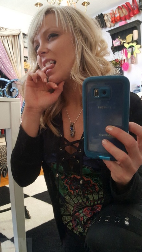 Cute blonde amateur Meet Madden takes selfies while removing her clothes