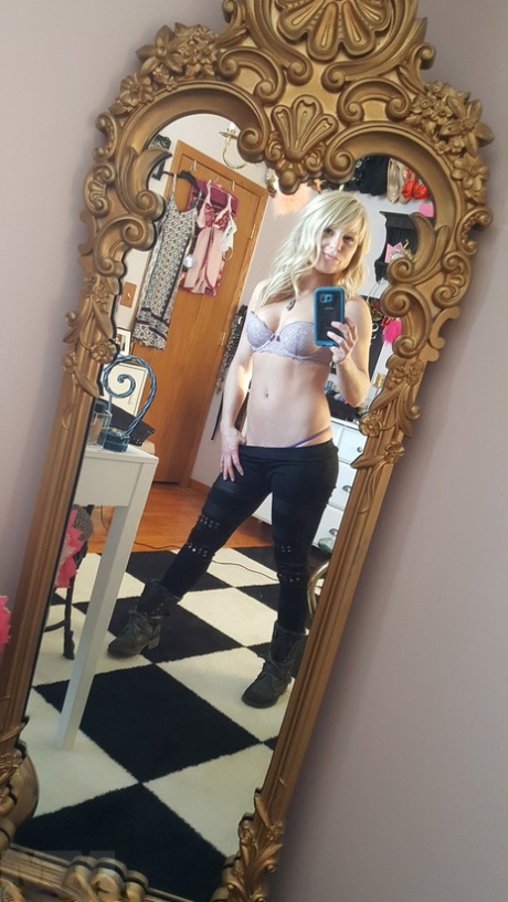 Cute blonde amateur Meet Madden takes selfies while removing her clothes