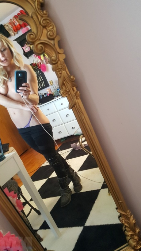 Cute blonde amateur Meet Madden takes selfies while removing her clothes