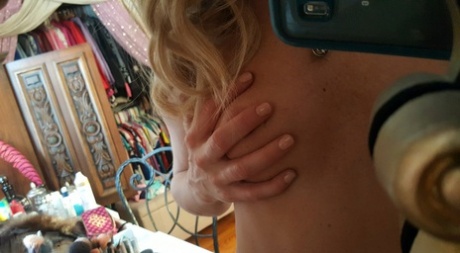 Cute blonde amateur Meet Madden takes selfies while removing her clothes