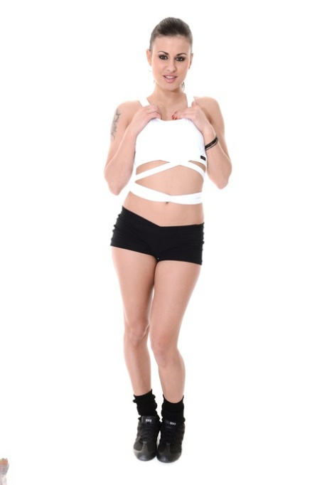Sexy girl Billie Star strips to black socks and running shoes
