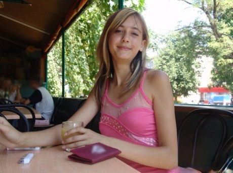 Dirty blonde teen flashes a no panty upskirt inside a restaurant