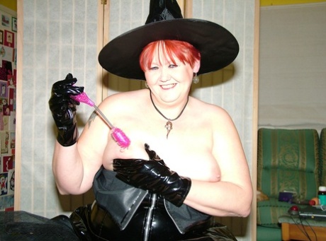 Redheaded mature witch Valgasmic Exposed masturbates with a funky sex toy