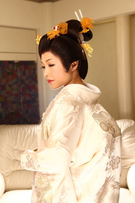 Japanese woman Yui Ayana has her breasts fondled under traditional clothing