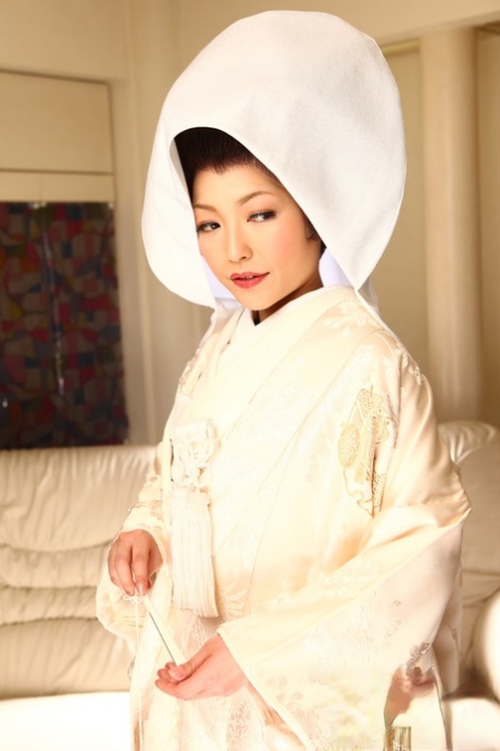 Japanese woman Yui Ayana has her breasts fondled under traditional clothing