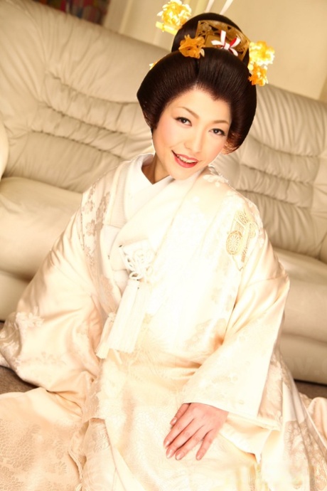 Japanese woman Yui Ayana has her breasts fondled under traditional clothing