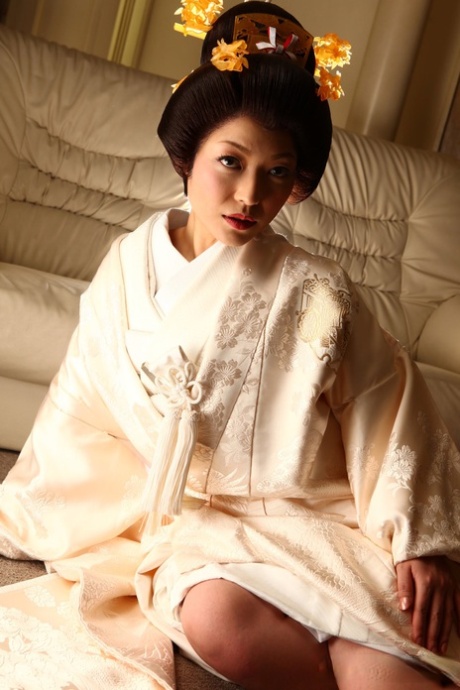 Japanese woman Yui Ayana has her breasts fondled under traditional clothing