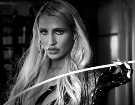 Seductive blonde temptress with big tits strikes hot solo poses