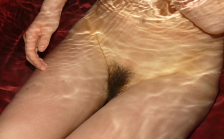 Cute redheaded Japanese teen Rinko gets naked to bathe on a winter's day