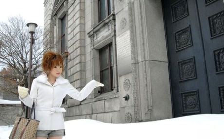 Cute redheaded Japanese teen Rinko gets naked to bathe on a winter's day