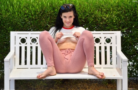 Teen girl with black hair rides a dildo before showing her bare ass in a pool