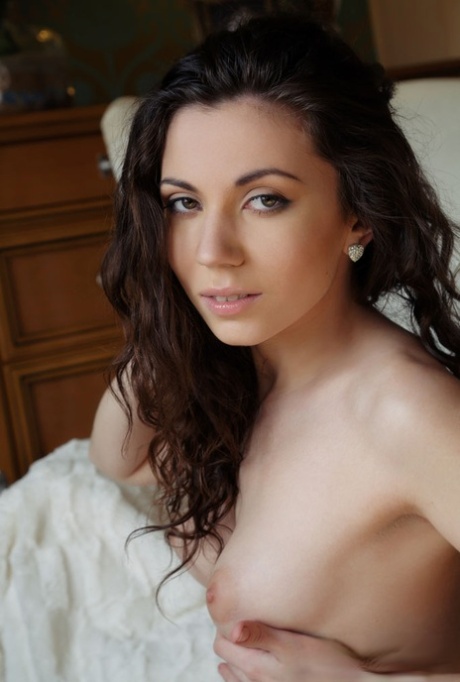 Naked teen with a great ass Sara H fingers her yummy pussy in solo action