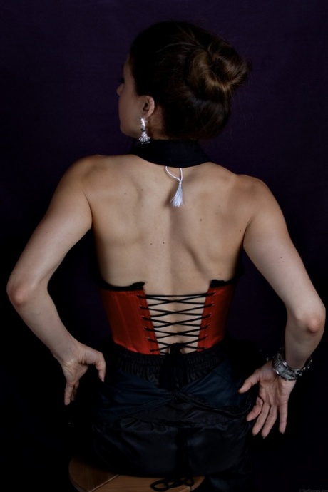 Skinny Indian female uncovers her tiny breasts during a solo shoot