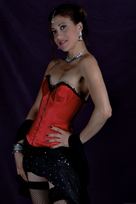 Skinny Indian female uncovers her tiny breasts during a solo shoot