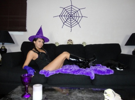 Teen amateur Andi Land teases during upskirt action in a Halloween outfit