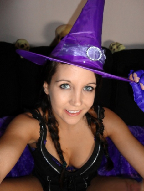 Teen amateur Andi Land teases during upskirt action in a Halloween outfit