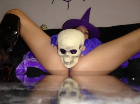 Teen amateur Andi Land teases during upskirt action in a Halloween outfit