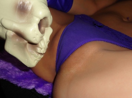 Teen amateur Andi Land teases during upskirt action in a Halloween outfit