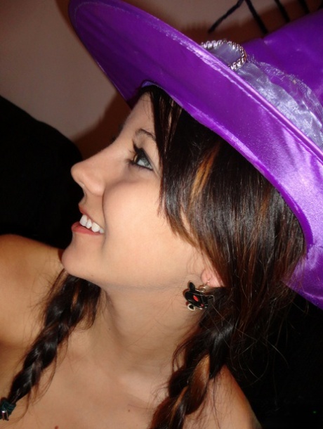 Teen amateur Andi Land teases during upskirt action in a Halloween outfit
