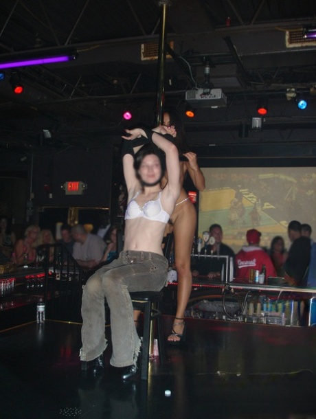 Asian stripper Katsuni is captured in candid action at an adult club