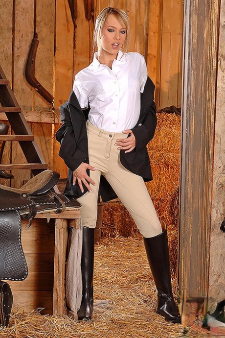 Hot blonde Blue Angel ditches riding attire to masturbate in the tack room