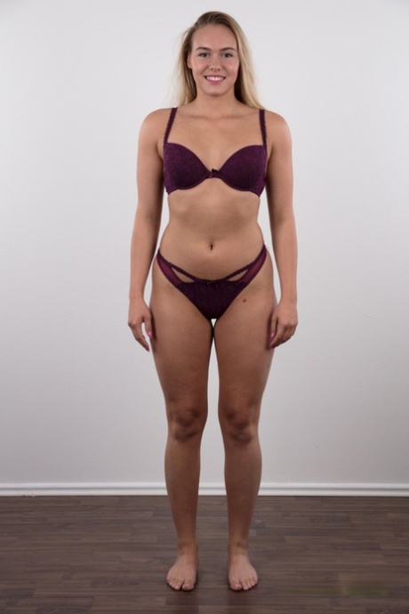 Fully clothed 18 year old Silvie stands butt naked after removing her clothes