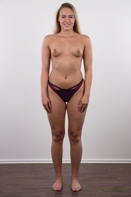 Fully clothed 18 year old Silvie stands butt naked after removing her clothes