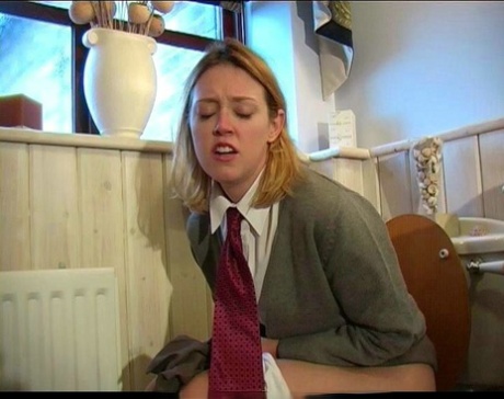 Misbehaving female students receive a brutal paddling from a female teacher