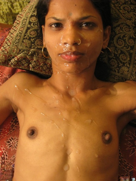 Skinny Indian girl receives a facial cumshot after sex with her man friend