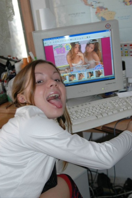 Barely legal student exposes her cotton underwear while watching pornography