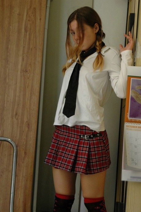 Barely legal student exposes her cotton underwear while watching pornography