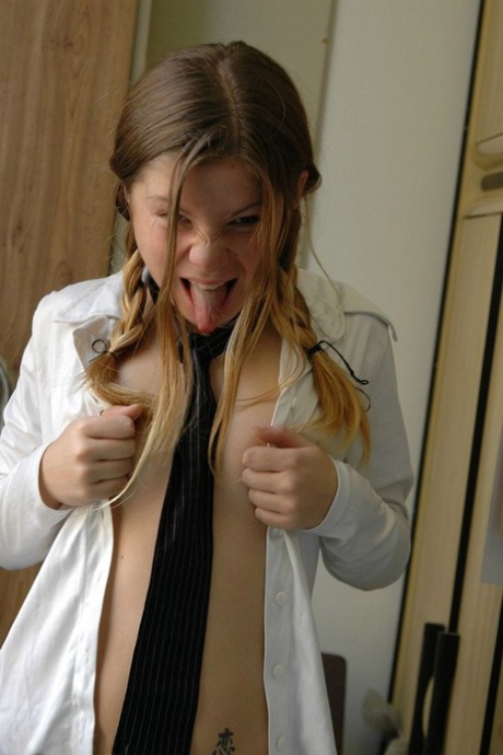 Barely legal student exposes her cotton underwear while watching pornography