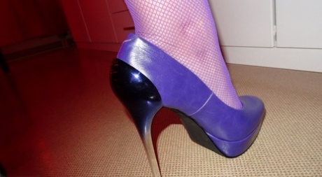 Sexy nan Abby Roberts sheds satin lingerie and stiletto heels to gets naked