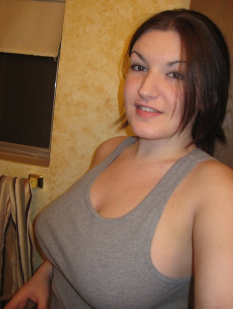 Big titted amateur takes safe for work selfies in a mirror