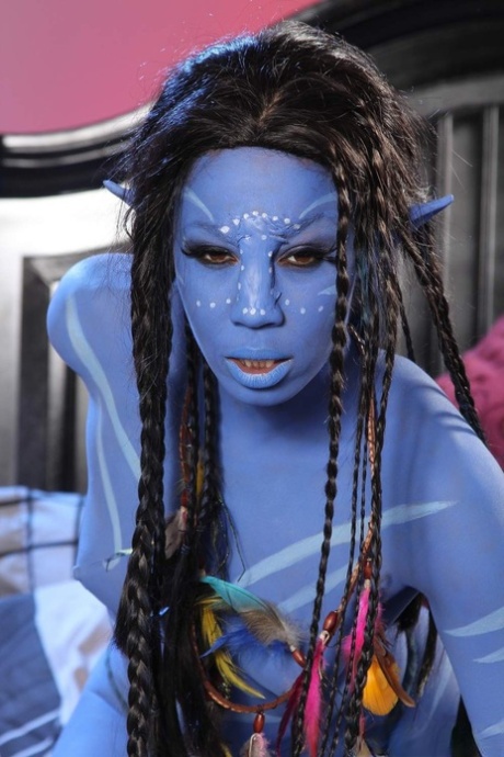 Cosplay beauty Misty Stone takes cock in nothing but blue body paint